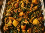 Mixed vegetable and offal stew in aluminum tray