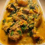 Yellow pepper soup or light soup with offal and greens